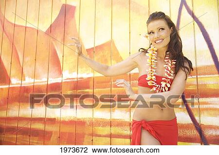 Hawaii, Kauai, Kapaa, Beautiful Woman Dancing Hula On A Beautiful Painted Backdrop Of A Beach. View Large Photo Image Stock Image - Hawaii, Kauai, Kapaa, Beautiful Woman Dancing Hula On A Beautiful Painted Backdrop Of A Beach.. Fotosearch