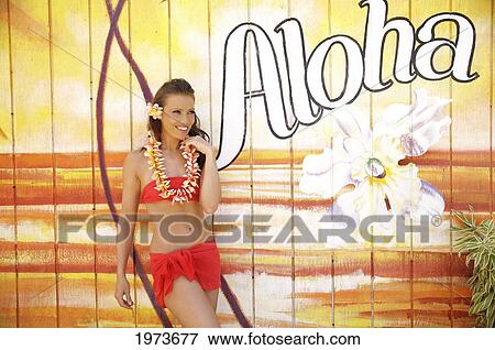 Hawaii, Kauai, Kapaa, Beautiful Woman Dancing Hula On A Beautiful Painted Backdrop Of A Beach. View Large Photo Image Stock Photo - Hawaii, Kauai, Kapaa, Beautiful Woman Dancing Hula On A Beautiful Painted Backdrop Of A Beach.. Fotosearch