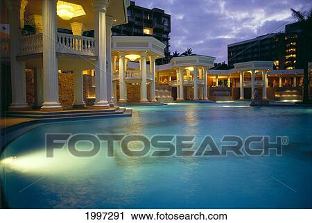 Stock Image - Hawaii, Kauai, Kauai Marriott Central Area At Nighttime Pool Illuminated A49F. Fotosearch