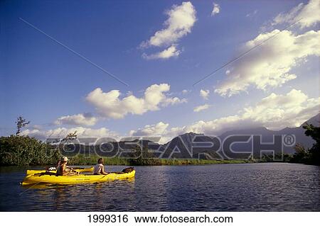 Stock Photograph - Hawaii, Kauai, Kayaking Along Hanalei River. Fotosearch
