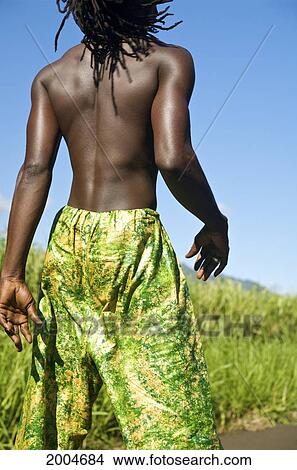Picture - Hawaii, Kauai, Kealia, African Dancer Alongside Country Road.. Fotosearch