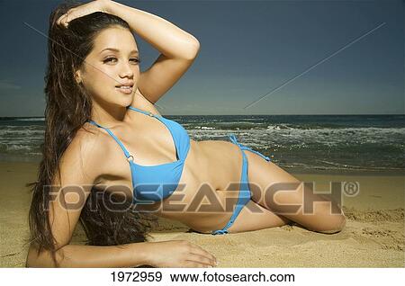 Hawaii, Kauai, Kealia Beach, Attractive Young Woman On The Beach. View Large Photo Image Stock Photo - Hawaii, Kauai, Kealia Beach, Attractive Young Woman On The Beach.. Fotosearch