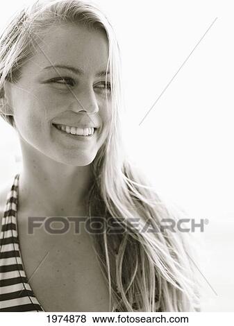 Stock Photo - Hawaii, Kauai, Kealia Beach, Surfer Girl Enjoying A Day Out.. Fotosearch