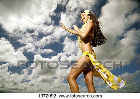 Hawaii, Kauai, Kealia, Beautiful Hawaiian Girl Dancing Hula On Ocean Shoreline. View Large Photo Image Stock Image - Hawaii, Kauai, Kealia, Beautiful Hawaiian Girl Dancing Hula On Ocean Shoreline.. Fotosearch