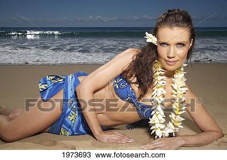Hawaii, Kauai, Kealia, Beautiful Woman Dancing Hula On Ocean Shoreline. View Large Photo Image Stock Image - Hawaii, Kauai, Kealia, Beautiful Woman Dancing Hula On Ocean Shoreline.. Fotosearch