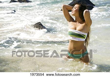 Hawaii, Kauai, Ke'e Beach, Attractive Young Woman In The Water. View Large Photo Image Picture - Hawaii, Kauai, Ke'e Beach, Attractive Young Woman In The Water.. Fotosearch