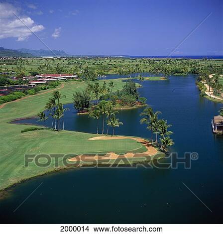 Picture - Hawaii, Kauai, Lihue, Kauai Lagoons Resort, Kiele Golf Course, Aerial View, Blue Sky D1313. Fotosearch