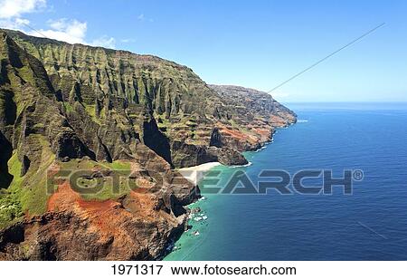 Stock Photo - Hawaii, Kauai, Na Pali Coast, Aerial Of Coastal Cliffs And Honopu Beach (Or Cathedral Beach) In Distance.. Fotosearch