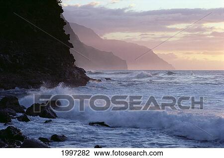 Stock Image - Hawaii, Kauai, Na Pali Coast, At Twilight, Rough Turbulent Ocean A40A. Fotosearch