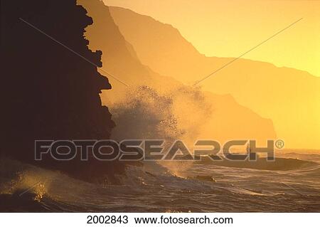 Hawaii, Kauai, Na Pali Coast At Sunset From Haena, Crashing Waves Against Rocks, Misty Yellow Sky View Large Photo Image Stock Image - Hawaii, Kauai, Na Pali Coast At Sunset From Haena, Crashing Waves Against Rocks, Misty Yellow Sky. Fotosearch