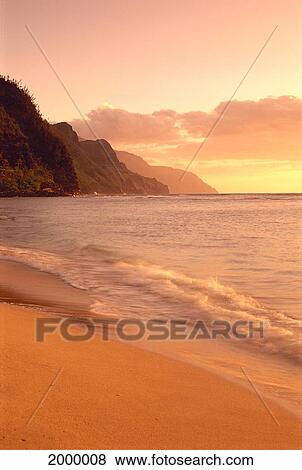 Stock Photo - Hawaii, Kauai, Na Pali Coast, At Sunset From Kee Beach, Golden Skies And Sand C1533. Fotosearch