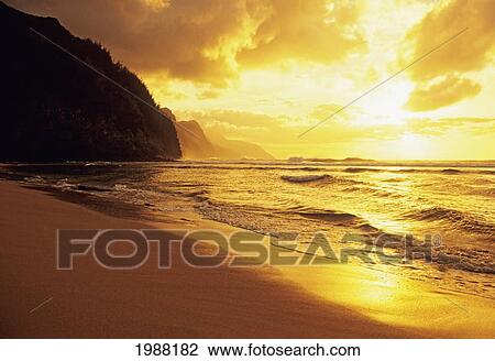 Hawaii, Kauai, Na Pali Coast, Beach At Sunset, Golden Orange Reflections View Large Photo Image Stock Image - Hawaii, Kauai, Na Pali Coast, Beach At Sunset, Golden Orange Reflections. Fotosearch