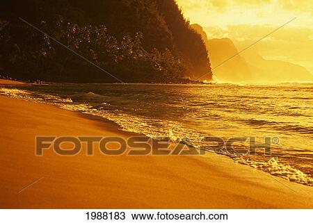 Hawaii, Kauai, Na Pali Coast, Beach At Sunset, Golden Orange Reflections View Large Photo Image Stock Image - Hawaii, Kauai, Na Pali Coast, Beach At Sunset, Golden Orange Reflections. Fotosearch