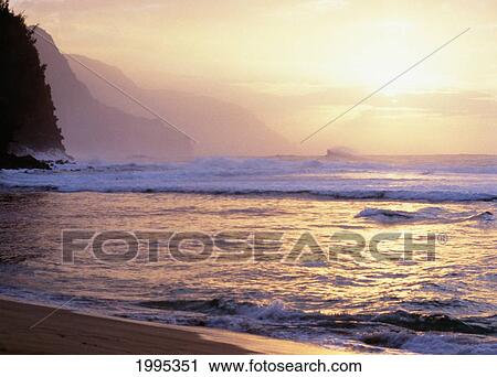 Hawaii, Kauai, Na Pali Coast, Beach At Sunset, Cliffs In Background. View Large Photo Image Stock Image - Hawaii, Kauai, Na Pali Coast, Beach At Sunset, Cliffs In Background.. Fotosearch