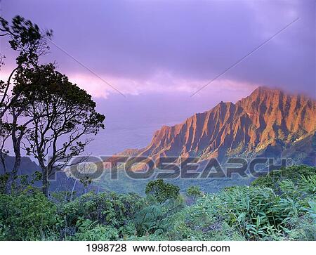 Stock Photo - Hawaii, Kauai, Na Pali Coast, Kalalau Valley, Kaaalahina Ridge, Purple Sky B1535. Fotosearch