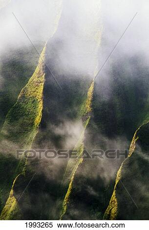 Stock Photography - Hawaii, Kauai, Na Pali Coast, Kalalau Valley, Aerial Cliffs And Mist In The Valley Of The Lost Tribes. Fotosearch