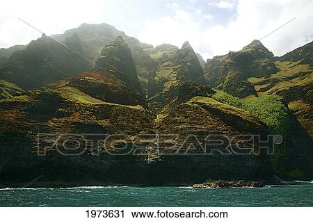 Stock Image - Hawaii, Kauai, Na Pali Coast, Rugged Cliffs Along Ocean.. Fotosearch