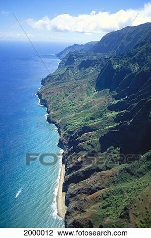 Stock Image - Hawaii, Kauai, Na Pali Coastline With Dramatic Cliffs Mountain Detail, Beach And Ocean, Aerial C1537. Fotosearch