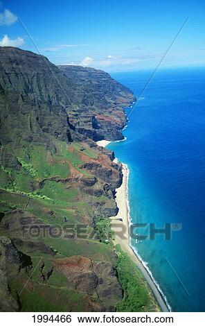 Stock Photograph - Hawaii, Kauai, Napali Coast Aerial Along Rugged Cliffs. Fotosearch