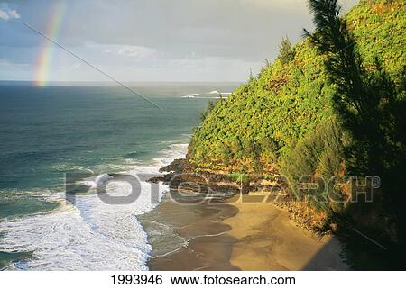 Hawaii, Kauai, Napali Coast, Hanakapiai Beach, Rainbow In Distance View Large Photo Image Stock Photograph - Hawaii, Kauai, Napali Coast, Hanakapiai Beach, Rainbow In Distance. Fotosearch