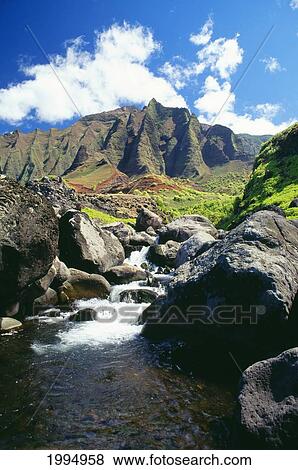 Hawaii, Kauai, Napali Coast, Stream Coming Down From The Kalalau Mountains View Large Photo Image Stock Photo - Hawaii, Kauai, Napali Coast, Stream Coming Down From The Kalalau Mountains. Fotosearch