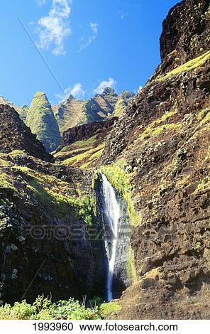 Hawaii, Kauai, Napali Coast, Waterfall Coming Down From The Base Of The Kalalau Mountains View Large Photo Image Stock Image - Hawaii, Kauai, Napali Coast, Waterfall Coming Down From The Base Of The Kalalau Mountains. Fotosearch
