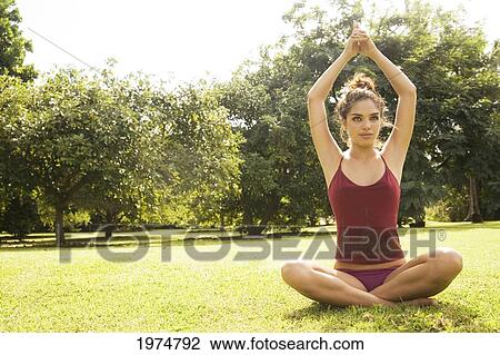 Hawaii, Kauai, North Shore, Beautiful Girl Excercising On Grassy Field. View Large Photo Image Stock Image - Hawaii, Kauai, North Shore, Beautiful Girl Excercising On Grassy Field.. Fotosearch