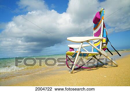 Hawaii, Kauai, North Shore, Haena Beach, Beach Chair Along Sandy Shore, Beautiful Sunny Day. View Large Photo Image Stock Image - Hawaii, Kauai, North Shore, Haena Beach, Beach Chair Along Sandy Shore, Beautiful Sunny Day.. Fotosearch