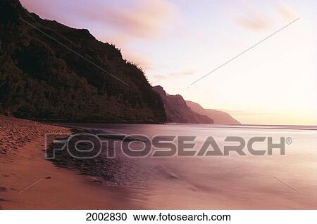 Hawaii, Kauai, North Shore, Na Pali Coast, Twilight, Water Rushes Onto Shore View Large Photo Image Stock Image - Hawaii, Kauai, North Shore, Na Pali Coast, Twilight, Water Rushes Onto Shore. Fotosearch