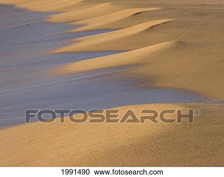 Stock Image - Hawaii, Kauai, North Shore, Sand Patterns On Donkey Beach (Paliku Or Kumukumu Beach). Fotosearch