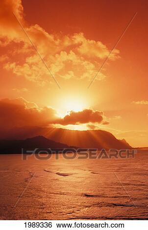 Stock Photograph - Hawaii, Kauai, North Shore, Sunset Over Bali Hai Point.. Fotosearch
