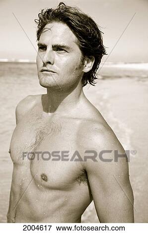 Hawaii, Kauai, North Shore, Young Male Models At The Beach. View Large Photo Image Stock Photo - Hawaii, Kauai, North Shore, Young Male Models At The Beach.. Fotosearch
