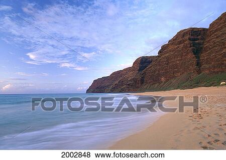 Stock Photo - Hawaii, Kauai, Polihale Beach With Afternoon Light, Shoreline Blur, Clouds. Fotosearch