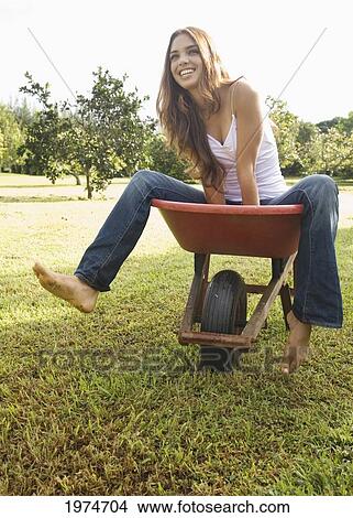 Hawaii, Kauai, Portrait Of Attractive Young Woman In A Crate. View Large Photo Image Picture - Hawaii, Kauai, Portrait Of Attractive Young Woman In A Crate.. Fotosearch