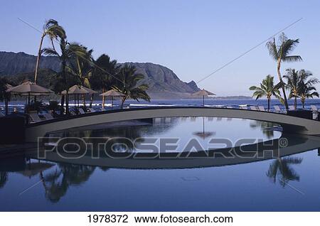 Hawaii, Kauai, Princeville Sheraton Resort, Reflections On Pool, Bali Hai In Distance. View Large Photo Image Stock Image - Hawaii, Kauai, Princeville Sheraton Resort, Reflections On Pool, Bali Hai In Distance.. Fotosearch