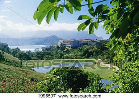Hawaii, Kauai, Princeville Sheraton Resort, Pond, Golf Course, Hanalei Bay In Background View Large Photo Image Stock Photo - Hawaii, Kauai, Princeville Sheraton Resort, Pond, Golf Course, Hanalei Bay In Background. Fotosearch