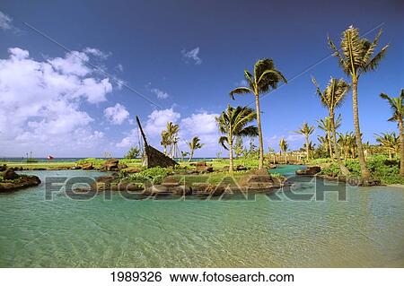 Stock Photograph - Hawaii, Kauai, South Shore, Poipu Beach Hyatt Regency Swimming Pool.. Fotosearch