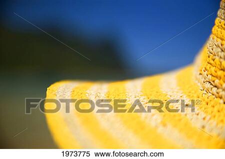Hawaii, Kauai, Tunnels Beach, Close-Up Of A Yellow Straw Hat On The Beach. View Large Photo Image Stock Photography - Hawaii, Kauai, Tunnels Beach, Close-Up Of A Yellow Straw Hat On The Beach.. Fotosearch