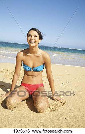 Hawaii, Kauai, Tunnel's Beach, Attractive Young Woman On The Beach. View Large Photo Image Stock Photograph - Hawaii, Kauai, Tunnel's Beach, Attractive Young Woman On The Beach.. Fotosearch