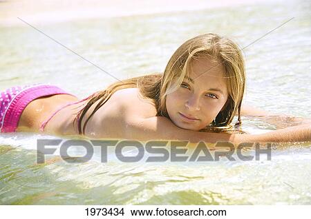 Hawaii, Kauai, Tunnels Beach, Surfer Girl Enjoying A Day Out. View Large Photo Image Picture - Hawaii, Kauai, Tunnels Beach, Surfer Girl Enjoying A Day Out.. Fotosearch