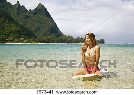 Hawaii, Kauai, Tunnels Beach, Surfer Girl Enjoying A Day Out. View Large Photo Image Stock Image - Hawaii, Kauai, Tunnels Beach, Surfer Girl Enjoying A Day Out.. Fotosearch