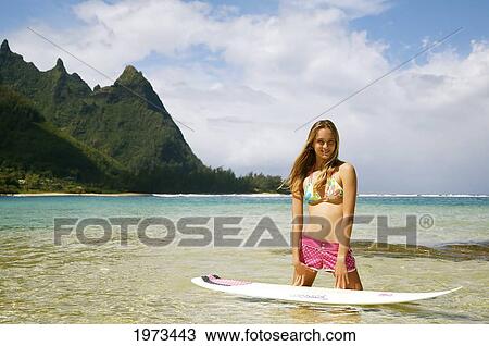 Hawaii, Kauai, Tunnels Beach, Surfer Girl Enjoying A Day Out. View Large Photo Image Stock Image - Hawaii, Kauai, Tunnels Beach, Surfer Girl Enjoying A Day Out.. Fotosearch