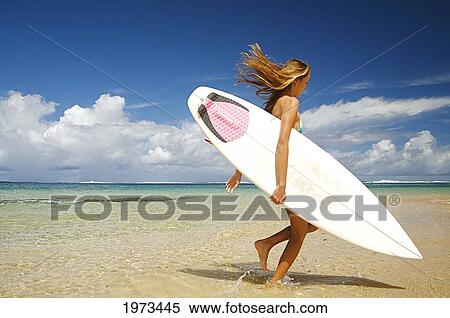 Hawaii, Kauai, Tunnels Beach, Surfer Girl Enjoying A Day Out. View Large Photo Image Stock Photography - Hawaii, Kauai, Tunnels Beach, Surfer Girl Enjoying A Day Out.. Fotosearch