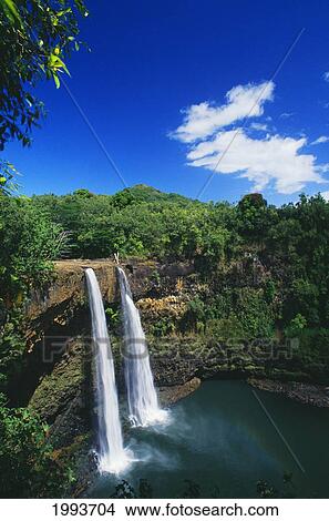 Picture - Hawaii, Kauai, Wailua Falls, 80 Foot High Waterfall Cascading Into Deep Pool.. Fotosearch