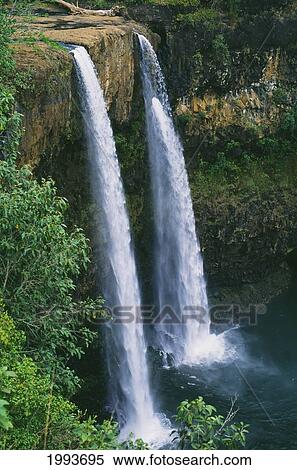 Stock Photography - Hawaii, Kauai, Wailua Falls, 80 Foot High Waterfall Cascading Into Deep Pool.. Fotosearch
