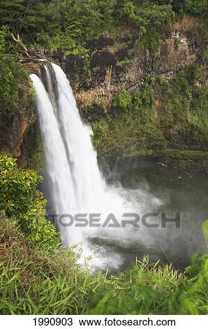 Hawaii, Kauai, Wailua Falls, An 80-Ft. High Waterfall On The Wailua River View Large Photo Image Stock Image - Hawaii, Kauai, Wailua Falls, An 80-Ft. High Waterfall On The Wailua River. Fotosearch