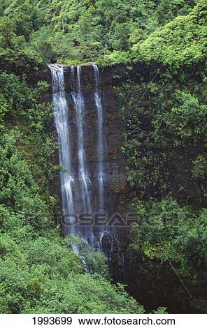 Stock Photo - Hawaii, Kauai, Waterfall On The Interior Regions Of The Island.. Fotosearch