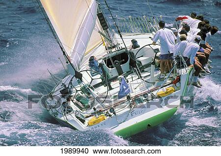 Stock Image - Hawaii, Kenwood Cup '96, Stern Of Exile, Crew Sit Along Rail. Fotosearch
