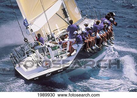 Stock Image - Hawaii, Kenwood Cup '96, Team Sits Along Rail, Kiel. Fotosearch