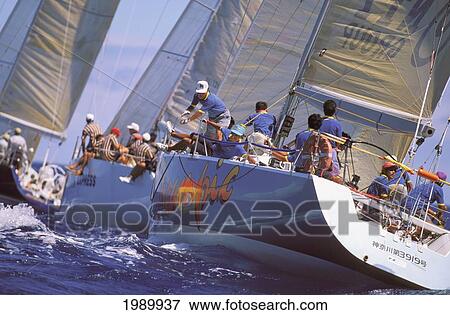 Stock Photo - Hawaii, Kenwood Cup '96, Three Yachts Jockey For Position, Teams In Action. Fotosearch